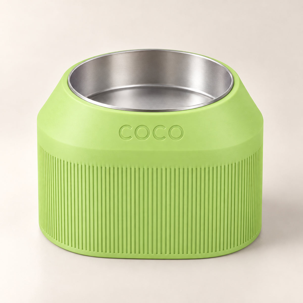 Cove Half Fluted custom-height dog bowl in Apple Green, with a removable stainless-steel bowl; COCO is an example name