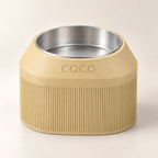 Cove Half Fluted custom-height dog bowl in Desert Tan, with a removable stainless-steel bowl; COCO is an example name