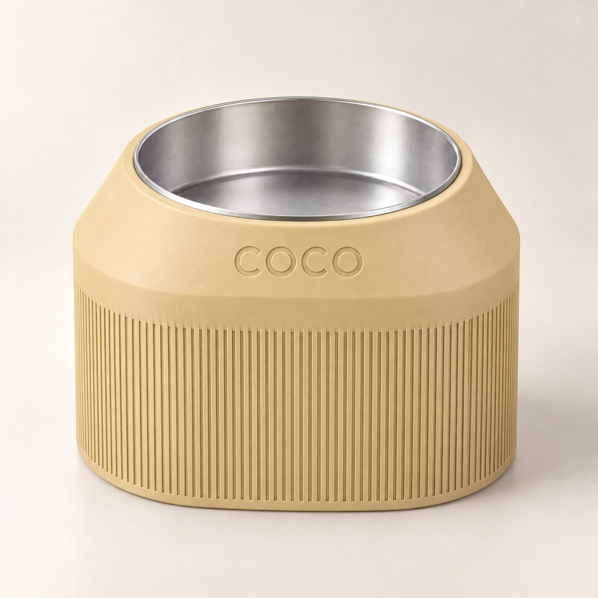 Cove Half Fluted custom-height dog bowl in Desert Tan, with a removable stainless-steel bowl; COCO is an example name