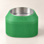 Cove Half Fluted custom-height dog bowl in Grass Green, with a removable stainless-steel bowl; COCO is an example name