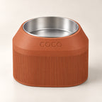 Cove Half Fluted custom-height dog bowl in Terracotta, with a removable stainless-steel bowl; COCO is an example name