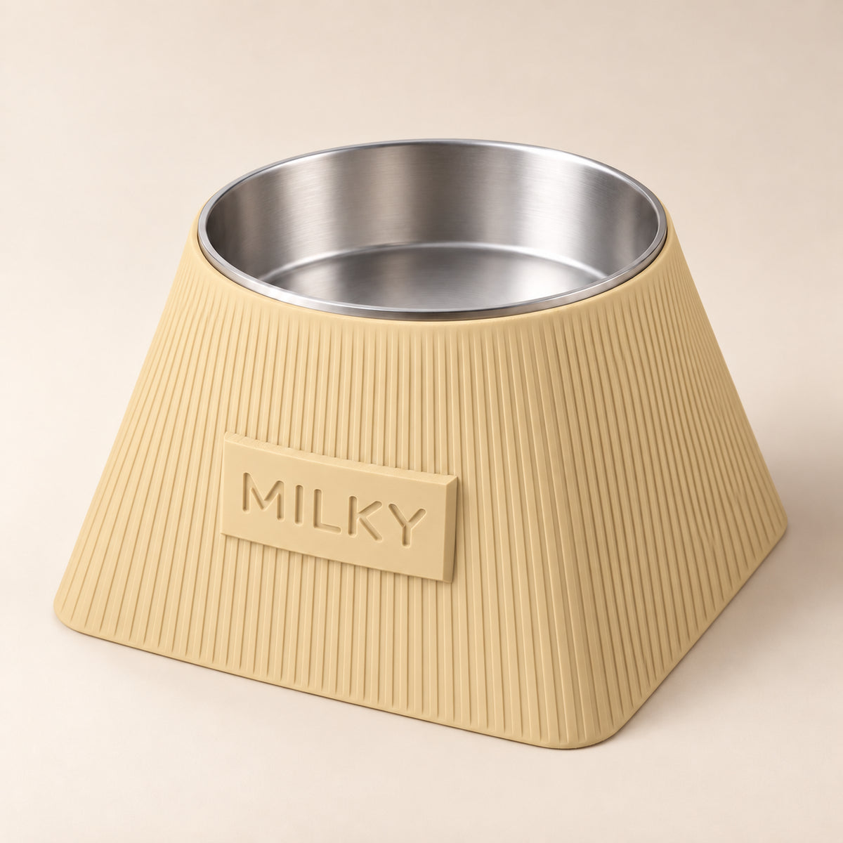 Frame custom-height dog bowl in Desert Tan, with a removable stainless-steel bowl; MILKY is an example name