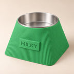 Frame custom-height dog bowl in Grass Green, with a removable stainless-steel bowl; MILKY is an example name