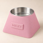 Frame custom-height dog bowl in Sakura Pink, with a removable stainless-steel bowl; MILKY is an example name