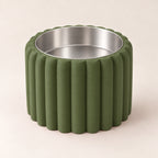 Petal Bold custom-height dog bowl in Dark Green, with a removable stainless-steel bowl; no nameplate
