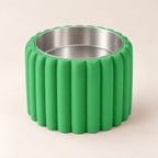 Petal Bold custom-height dog bowl in Grass Green, with a removable stainless-steel bowl; no nameplate