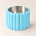 Petal Bold custom-height dog bowl in Ice Blue, with a removable stainless-steel bowl; no nameplate