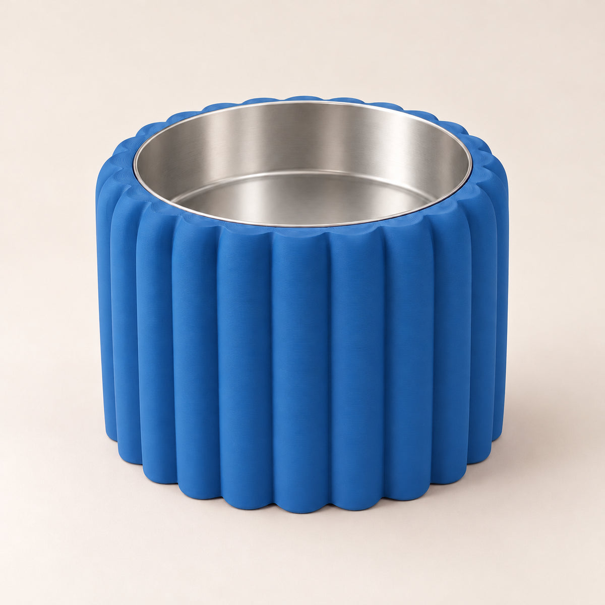 Petal Bold custom-height dog bowl in Marine Blue, with a removable stainless-steel bowl; no nameplate