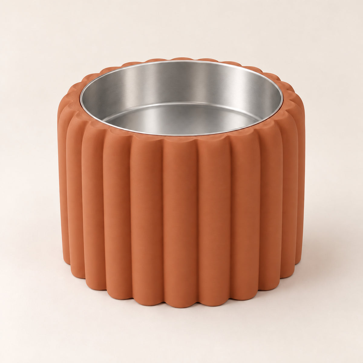 Petal Bold custom-height dog bowl in Terracotta, with a removable stainless-steel bowl; no nameplate