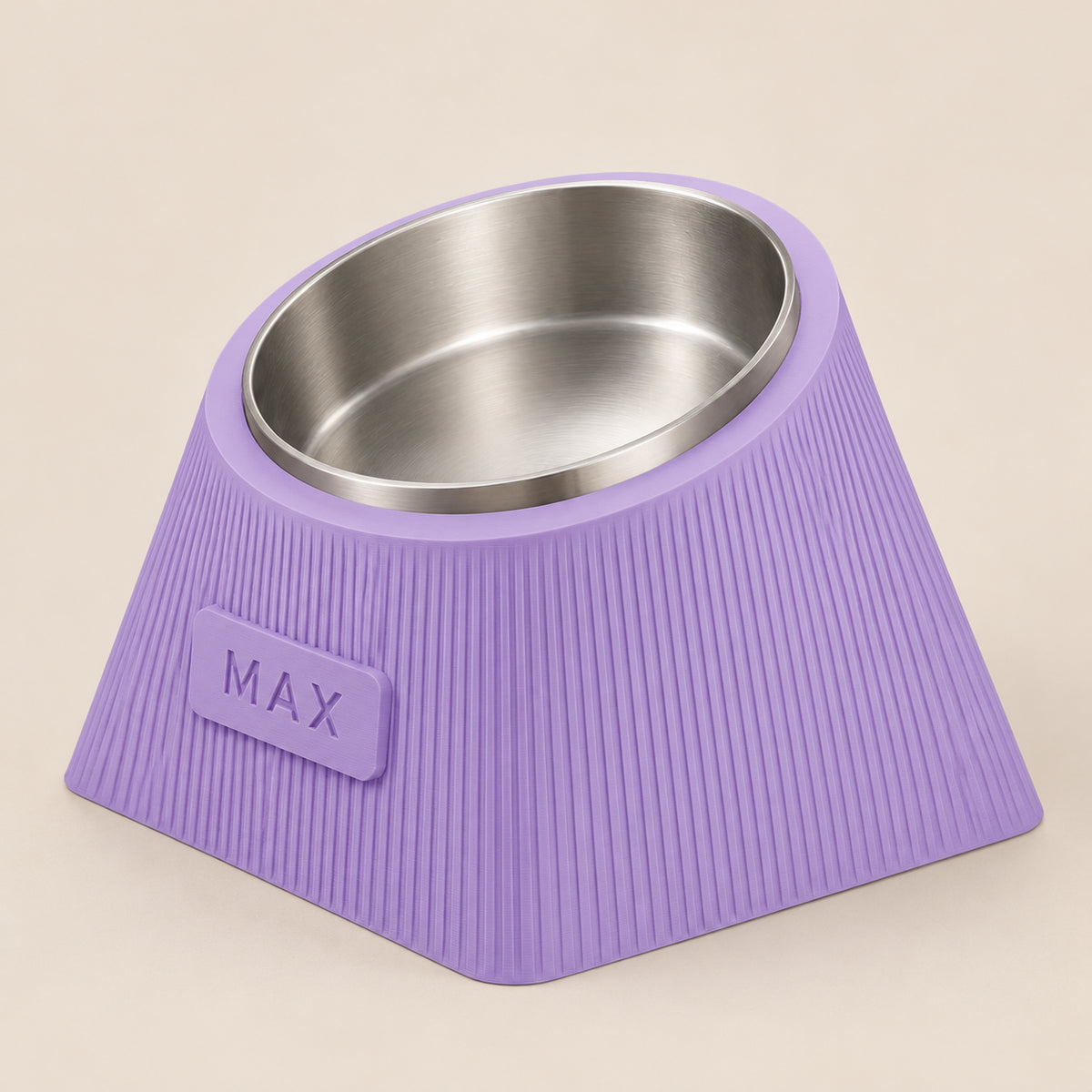 Contour Tilt dog bowl in Lilac Purple with vertical grooves, a tilted stainless steel bowl and MAX nameplate illustration.