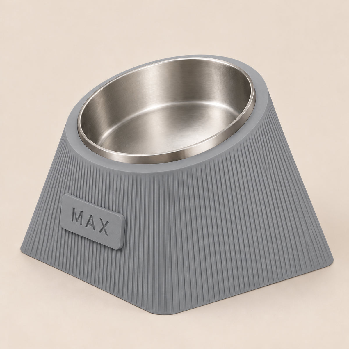 Contour Tilt custom height dog bowl in Nardo Gray, with a tilted stainless steel bowl, fine vertical grooves and MAX example nameplate.