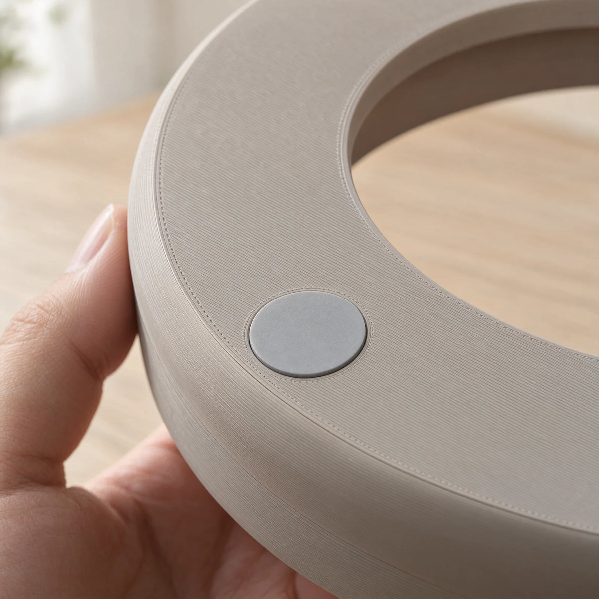 Gray silicone grip pad on the underside of the stand.